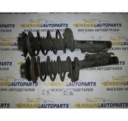 Амортизирующая стойка в сборе на Ford Escort.