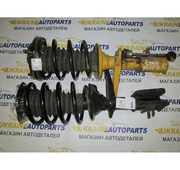 Амортизирующая стойка в сборе на Land Rover Freelander.