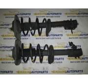 Амортизирующая стойка в сборе на Peugeot 806.