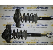 Амортизирующая стойка в сборе на Volkswagen Passat B5